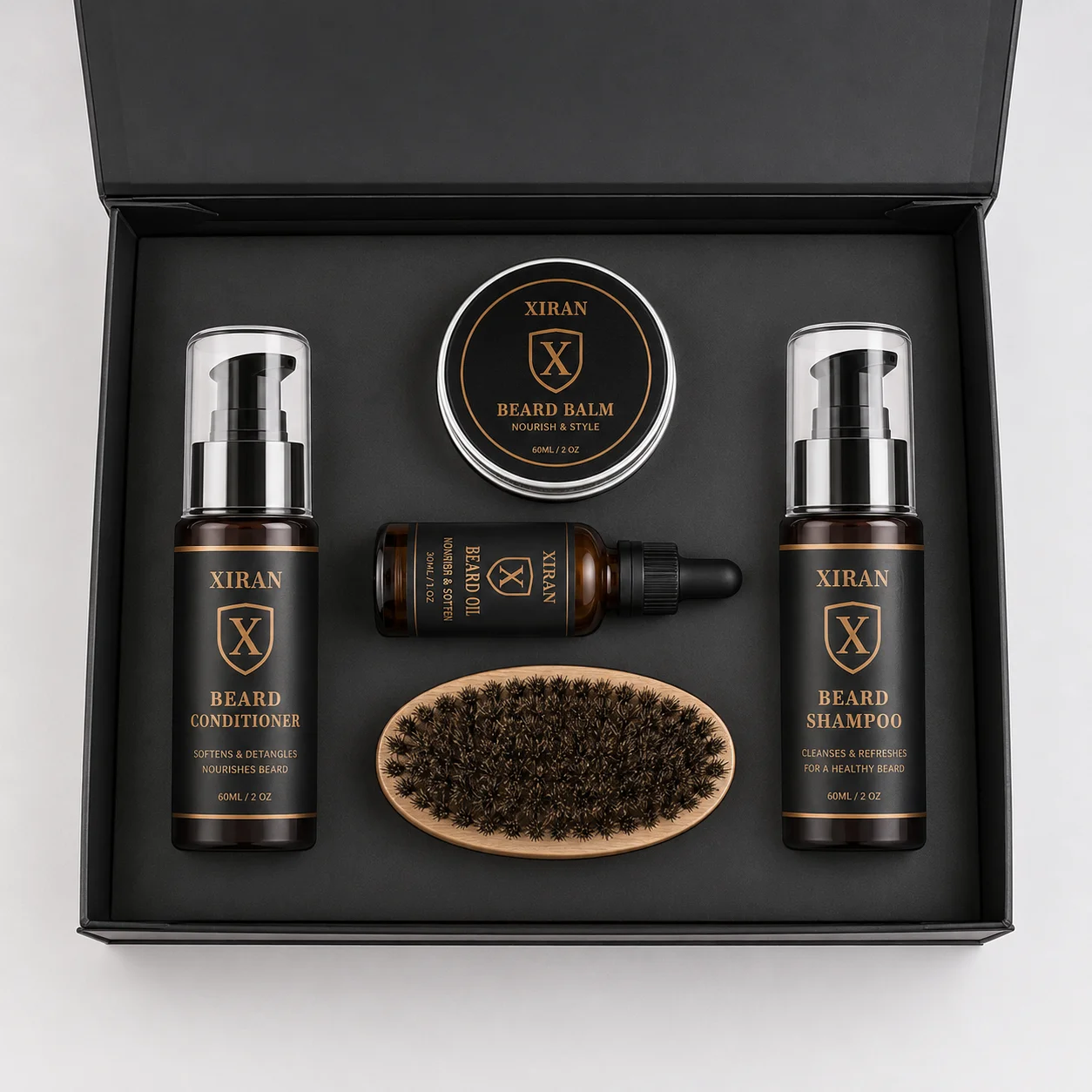 Xiran beard care kit featuring beard balm, oil, shampoo, conditioner, and wooden brush in sleek black packaging.